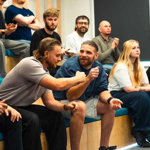 staff interacting during a meeting